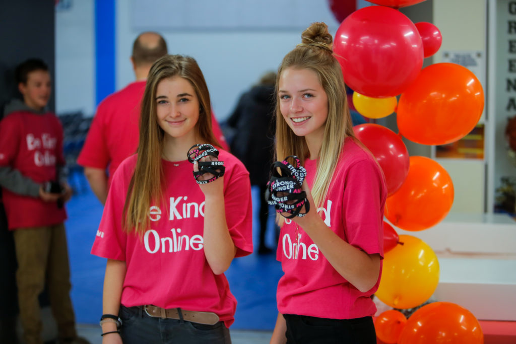 Two girls wearing Be Kind Online t-shirts at the 3rd annual IAS rally
